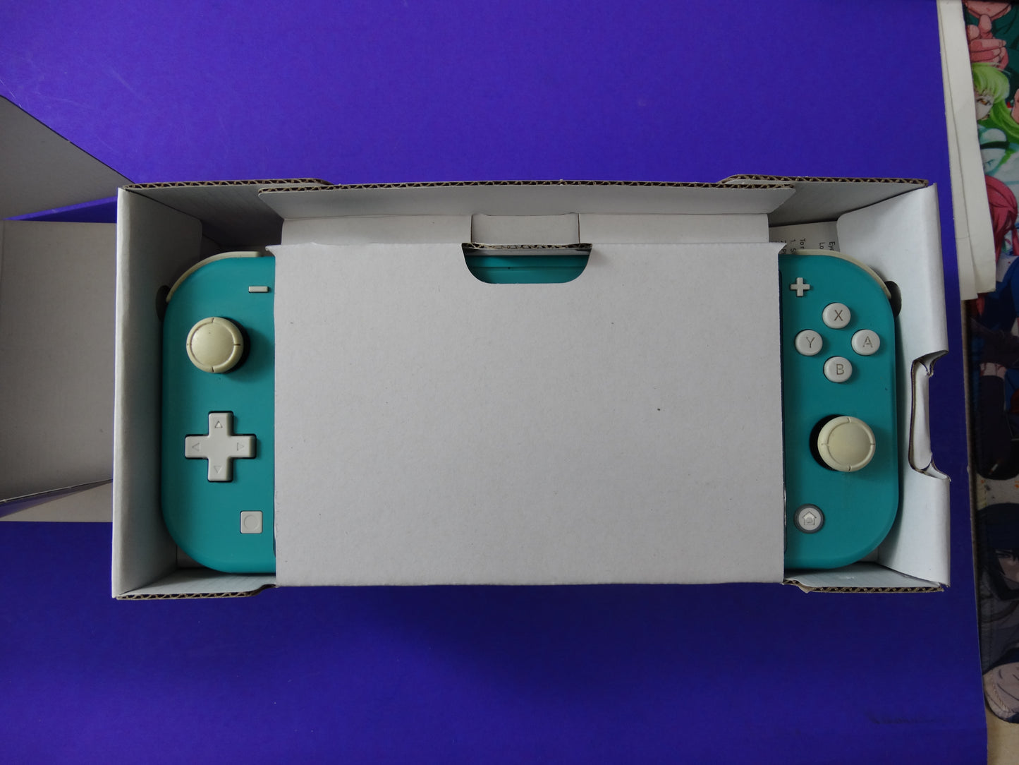 Nintendo Switch Lite – Turquoise Handheld Console – Portable Gaming System