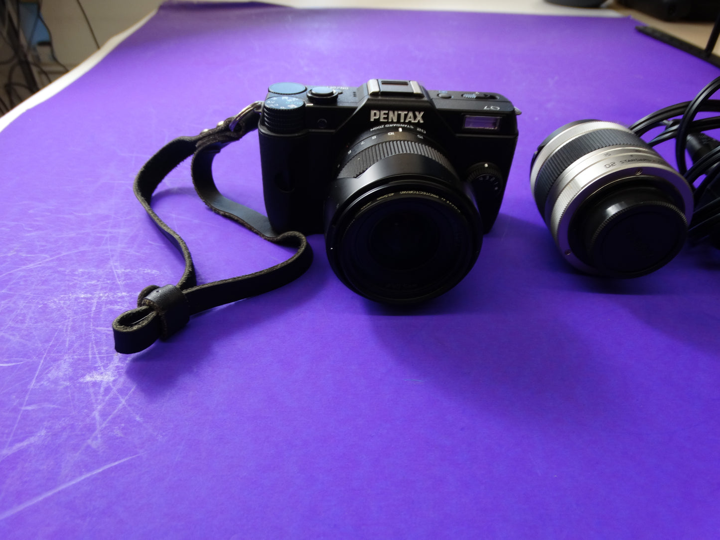 Pentax Q7 Mirrorless Camera Kit โ Body + 2 Lenses (Pentax 02 Standard Zoom) + Charger & Strap