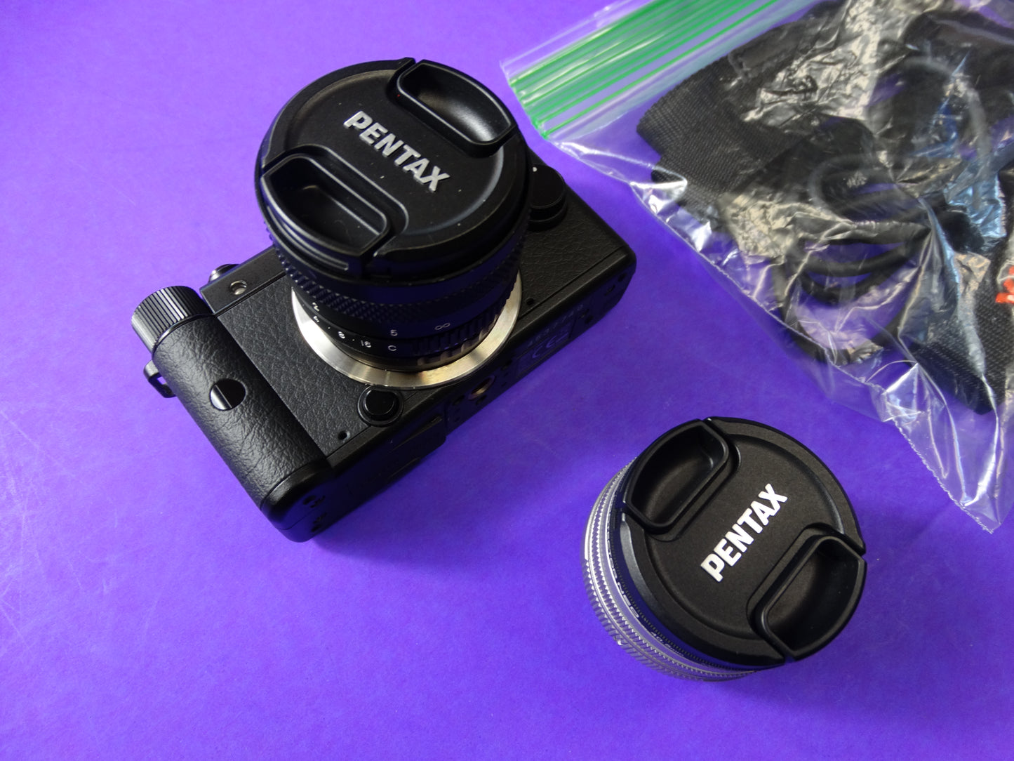 Pentax Q Mirrorless Digital Camera with 01 Standard Prime 8.5mm f/1.9 & 02 Standard Zoom 5–15mm Lenses
