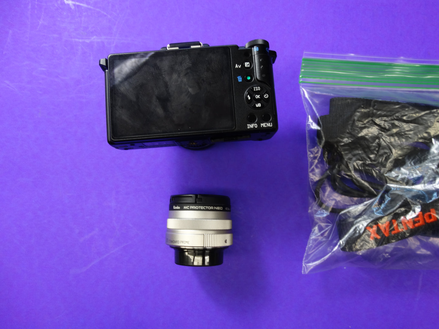 Pentax Q Mirrorless Digital Camera with 01 Standard Prime 8.5mm f/1.9 & 02 Standard Zoom 5–15mm Lenses