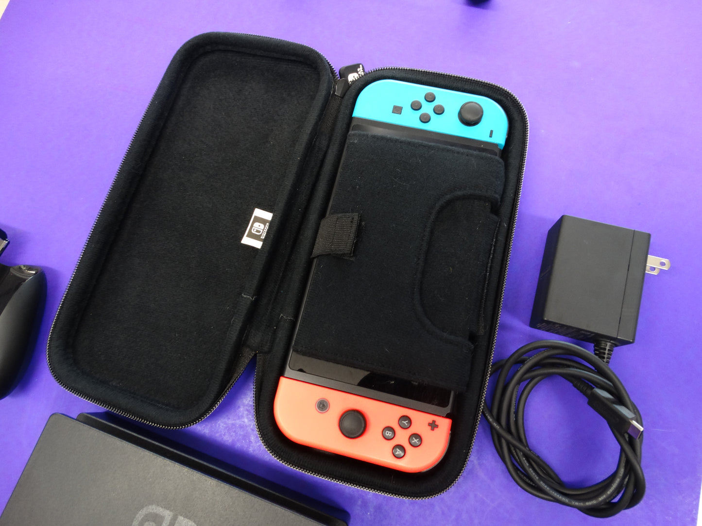 Nintendo Switch Console (Neon Red/Blue) with Dock, Joy-Con Grip, Charger, HDMI & Carrying Case – Complete Set - WeBuyElectronic