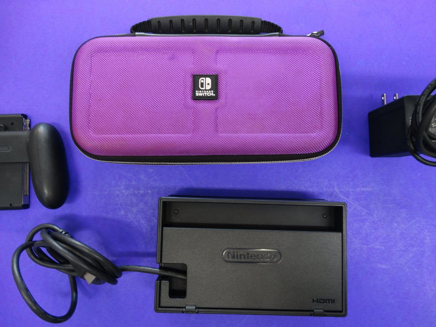 Nintendo Switch Console (Neon Red/Blue) with Dock, Joy-Con Grip, Charger, HDMI & Carrying Case – Complete Set - WeBuyElectronic