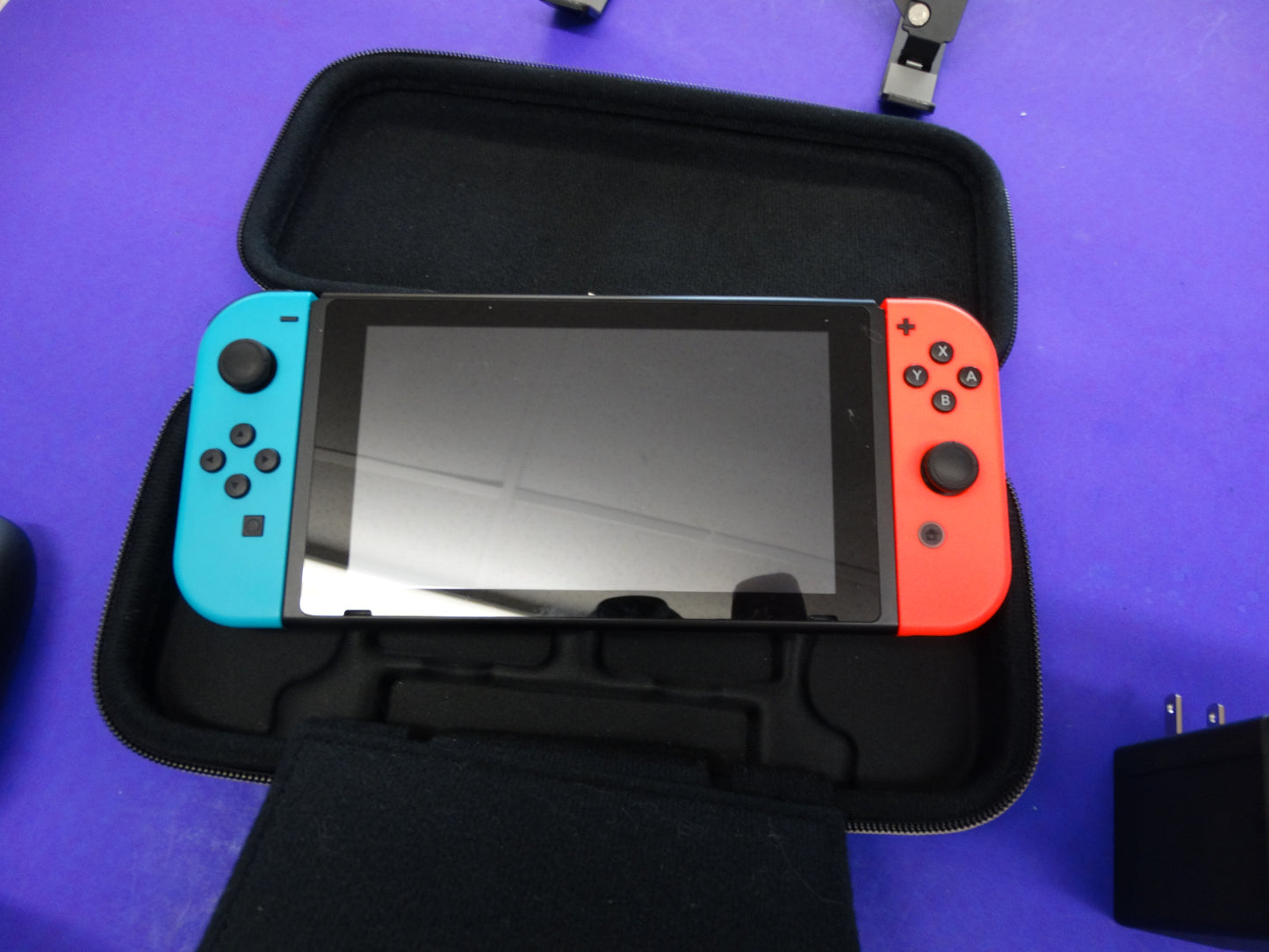 Nintendo Switch Console (Neon Red/Blue) with Dock, Joy-Con Grip, Charger, HDMI & Carrying Case – Complete Set - WeBuyElectronic