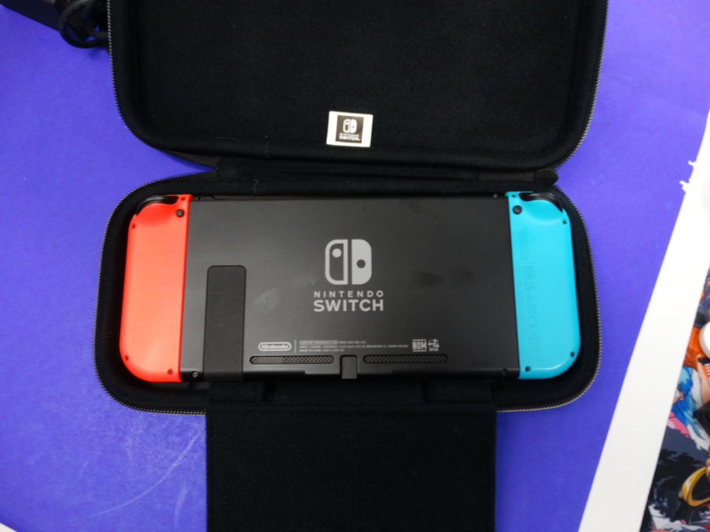Nintendo Switch Console (Neon Red/Blue) with Dock, Joy-Con Grip, Charger, HDMI & Carrying Case – Complete Set - WeBuyElectronic