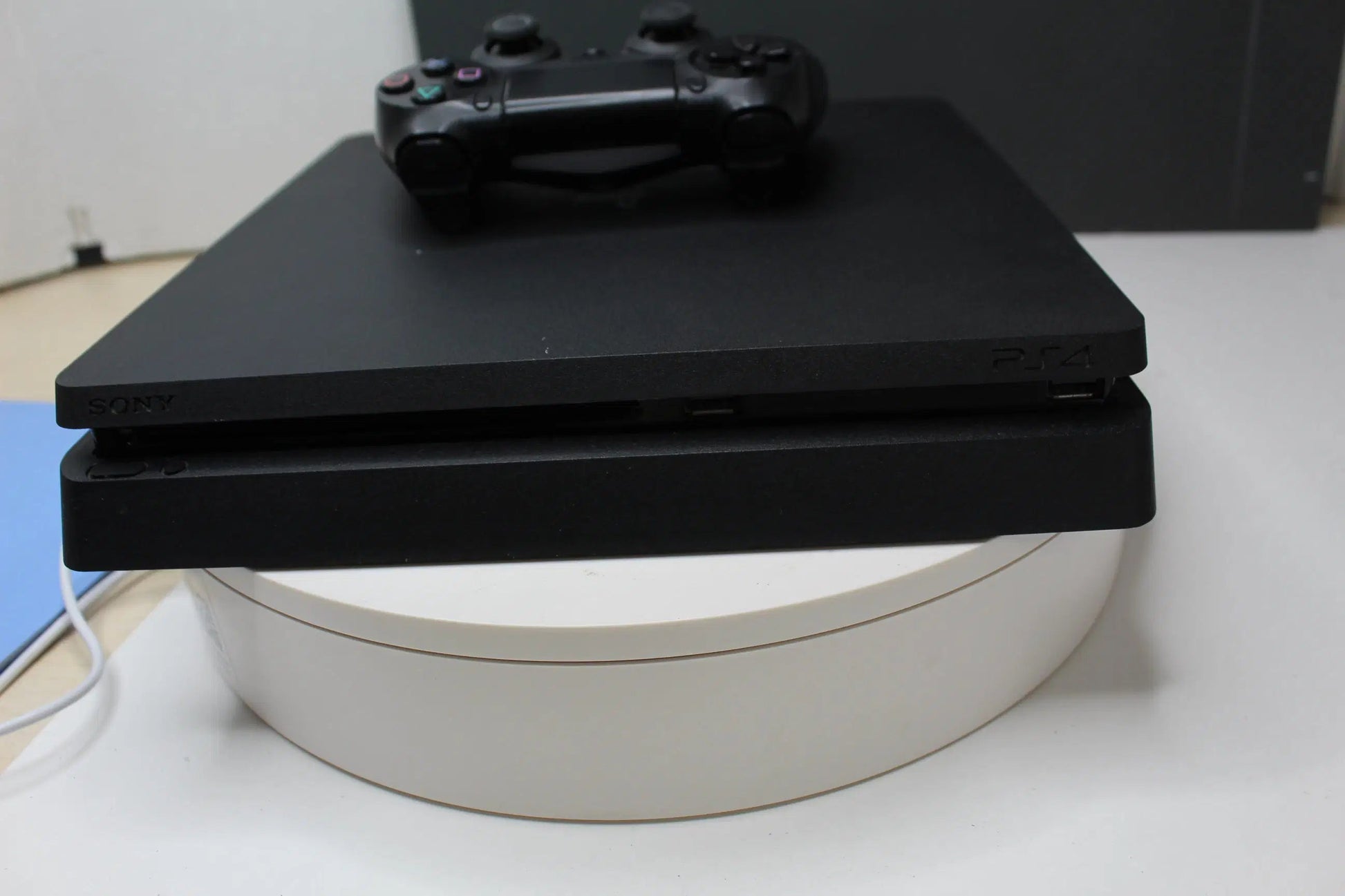 "Sony PlayStation 4 Slim 1TB Console Bundle with Controller, Game & All Cables – Ready to Play - WeBuyElectronic"