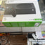 Xbox Series S 1TB SSD console retail box on a glass display counter in a retail store, with a controller pictured on the front of the packaging.