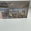 A boxed smart battery camera product labeled BEENOCAM, shown standing on a light surface. The front of the box features a grayscale interior room photo and the text 'Smart Battery Camera' and 'with AI-powered smart detection.