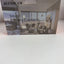 A boxed Beenocam Smart Battery Camera shown on a plain white surface, with the front packaging featuring a modern living room photo and product text.