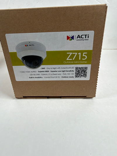 A brown cardboard product box for the ACTi Z715 Outdoor Mini Dome security camera, featuring a white and green product label on the front.