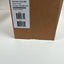 A brown cardboard shipping box with a white label from ACTi Corp. showing product details, photographed on a white surface.