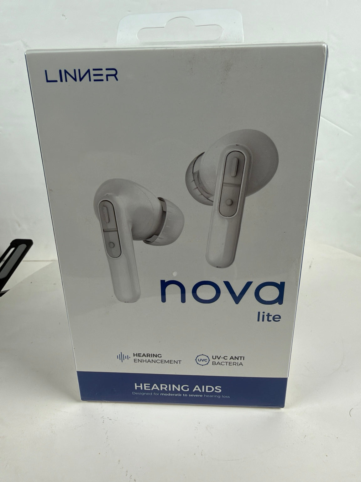 LINNER nova lite hearing aids retail packaging box, showing the product image of two light gray in-ear hearing aids on a white background with blue text.