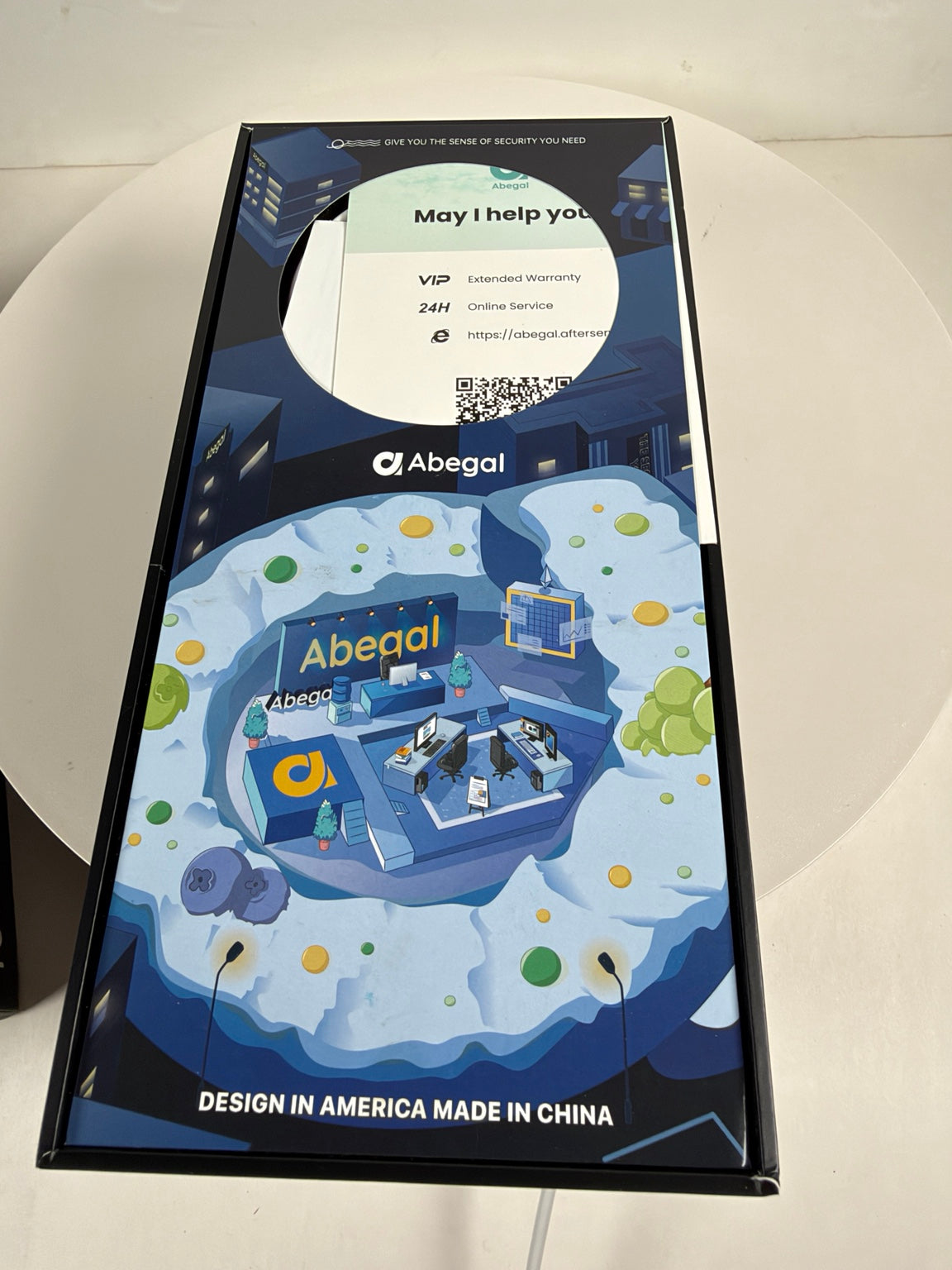 Abegal software packaging box featuring a stylized illustration of a digital workspace on a light-colored surface.