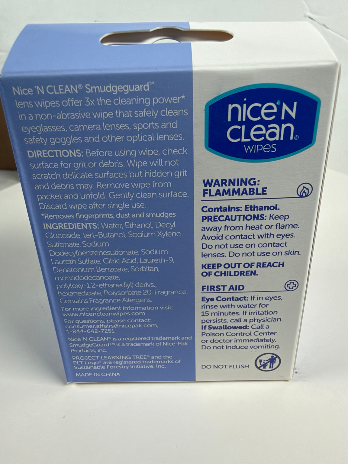 A box of Nice 'N Clean Smudgeguard lens wipes with blue and white packaging, photographed on a white background.