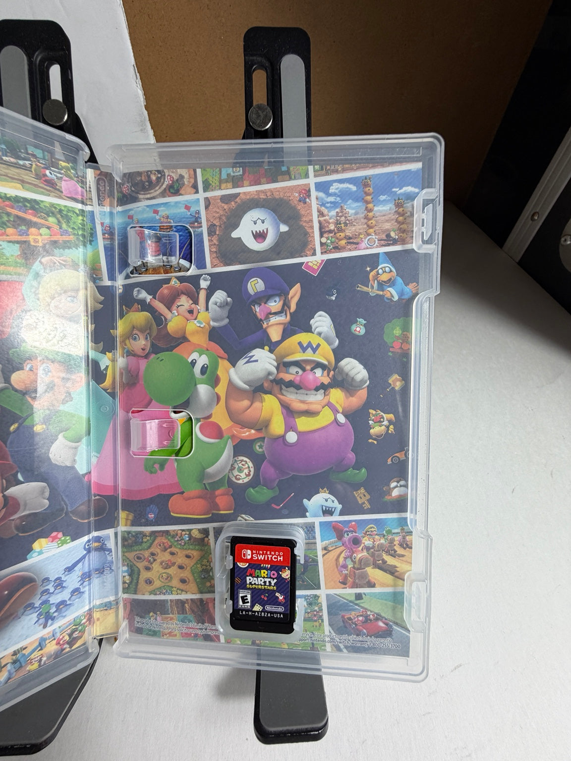 Mario Party Superstars Nintendo Switch original case opened showing included physical game cartridge