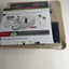A packaged wireless range extender setup guide booklet, model BR300, sealed in clear plastic on a light-colored surface.