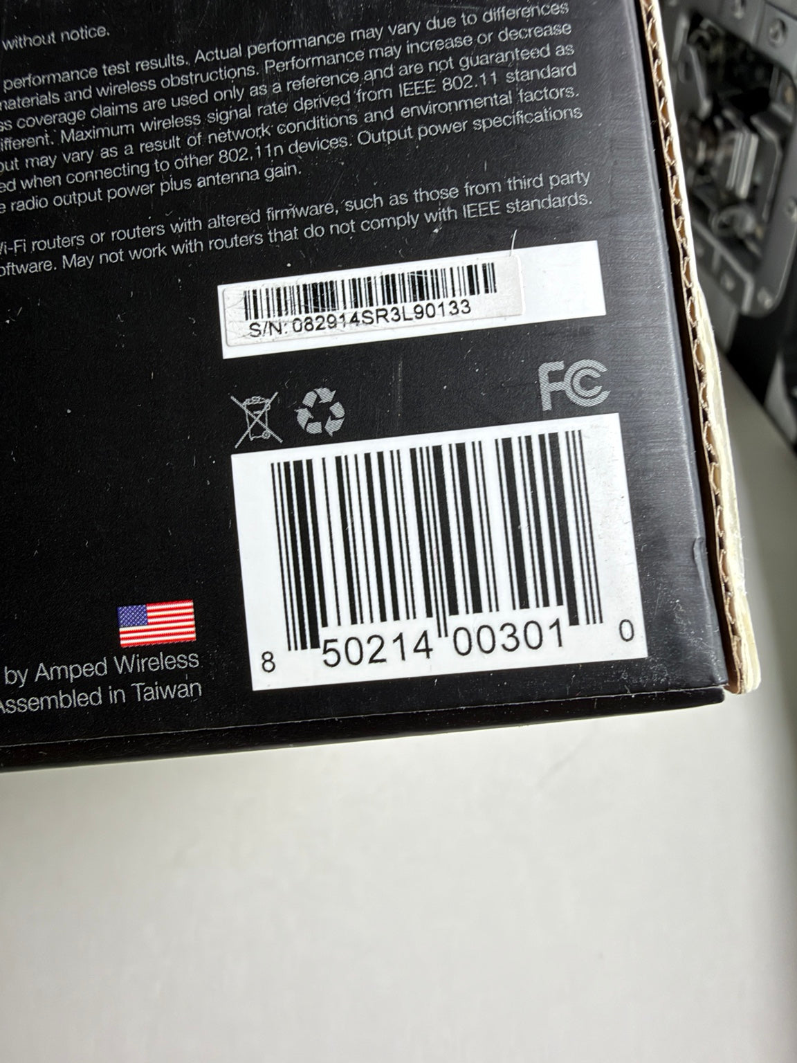Amped Wireless SR300 N300 WiFi Range Extender original packaging showing UPC barcode and technical specifications.