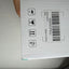 AlkiVision Wireless Light Bulb Camera original retail packaging showing product barcode and manufacturer information.