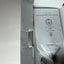 An open cardboard box containing a white paper manual for the Aqvidis Alibaba Smart Light Bulb Camera, nestled in gray protective foam.