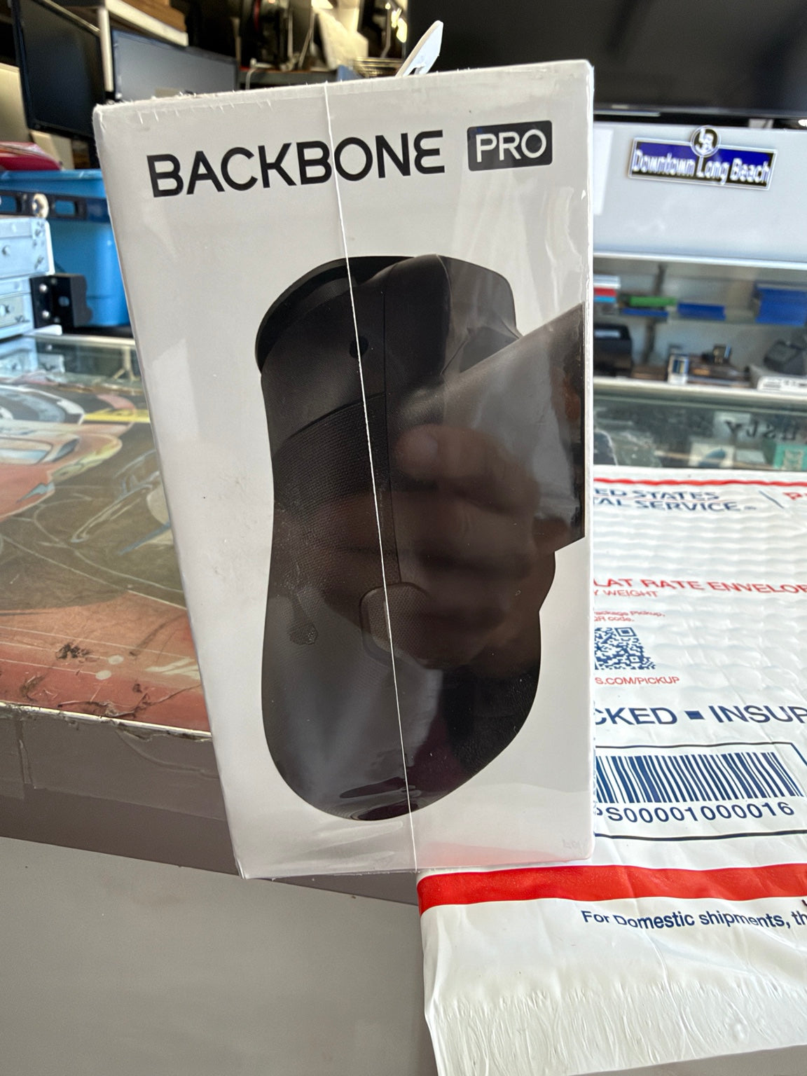 Backbone Pro black mobile gaming controller side view retail packaging
