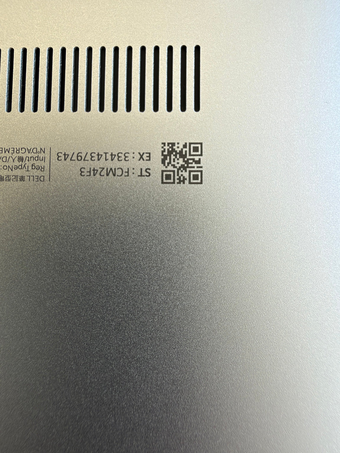Dell XPS 13 9310 silver bottom case showing model identification