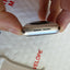 Apple Watch SE 40mm aluminum case side view showing speaker vents