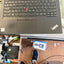 Lenovo ThinkPad E14 black keyboard with red TrackPoint and touchpad
