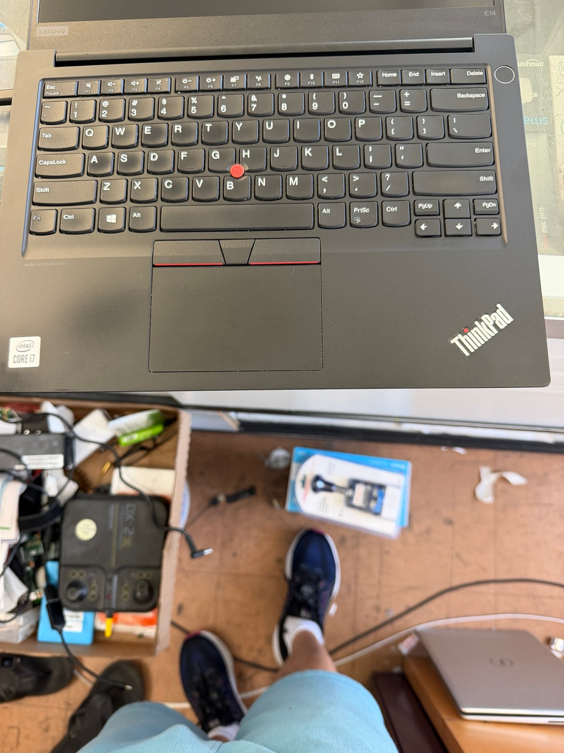 Lenovo ThinkPad E14 black keyboard with red TrackPoint and touchpad