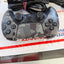 Sony PlayStation 5 DualSense gray camouflage wireless controller front view with buttons and thumbsticks