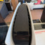 Sony PS5 Disc Edition top view showing glossy black center panel and ventilation