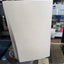 Close-up of Sony PS5 Disc Edition white exterior panel showing surface wear
