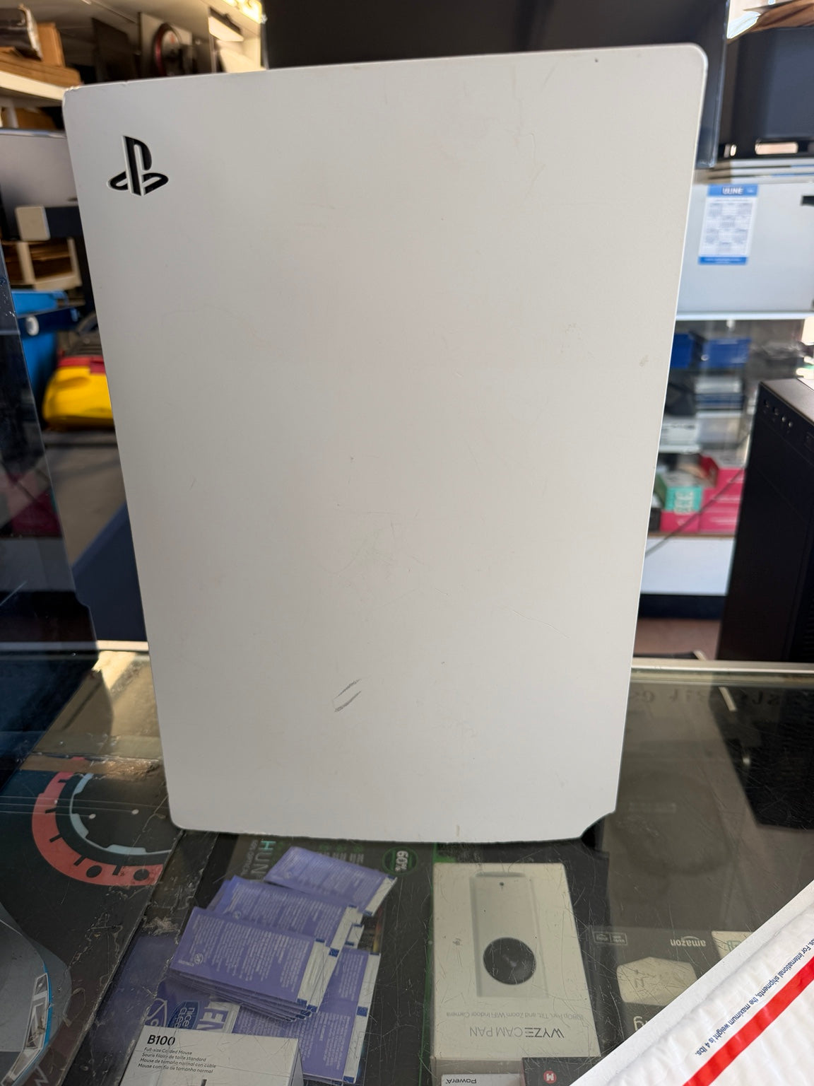 Sony PS5 Disc Edition white side cover with PlayStation logo and visible cosmetic wear