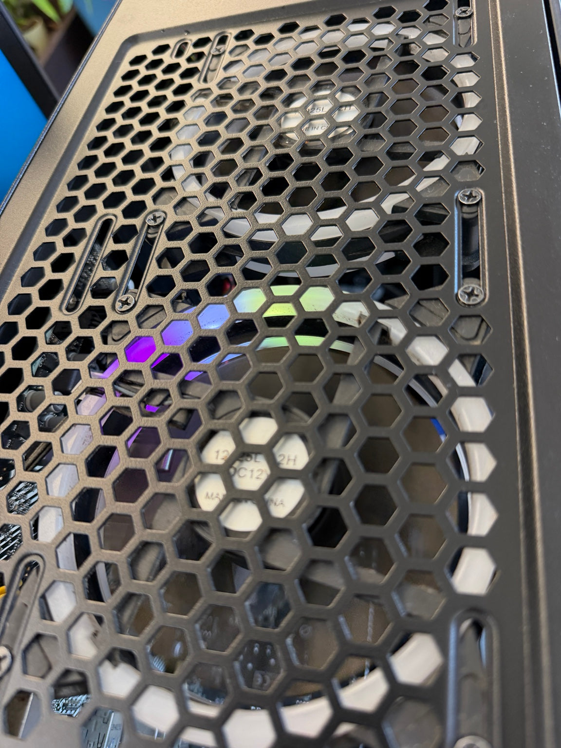Thermaltake gaming PC top cooling fan grille with RGB illuminated fans