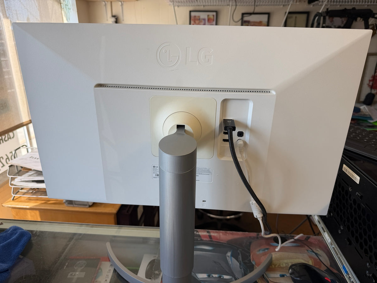 LG 27UL650-W height-adjustable stand and rear monitor view