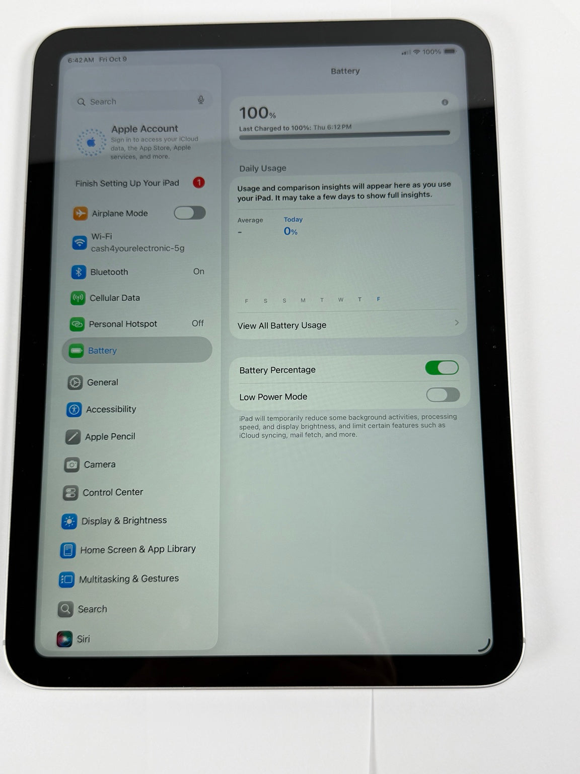 Apple iPad 10th Gen Silver showing battery settings and 100 percent charge