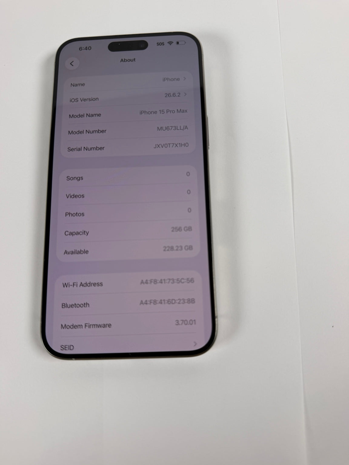 Apple iPhone 15 Pro Max 256GB model and iOS information screen
