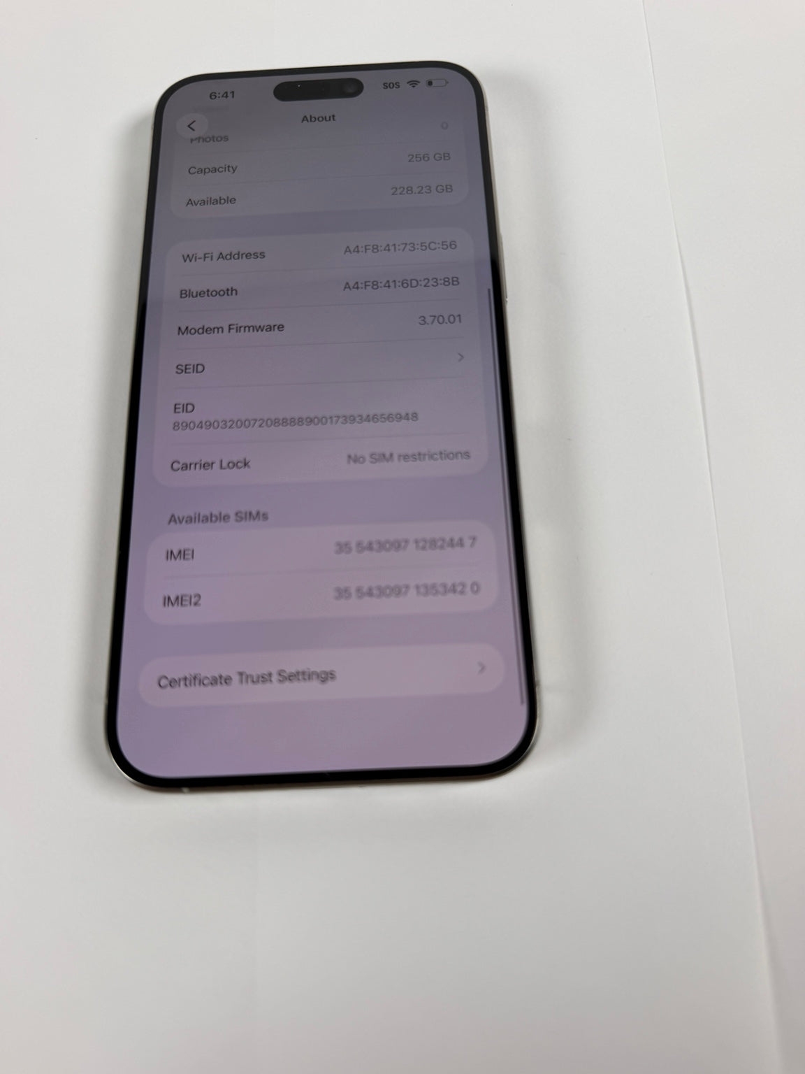Apple iPhone 15 Pro Max showing no SIM restrictions carrier unlocked