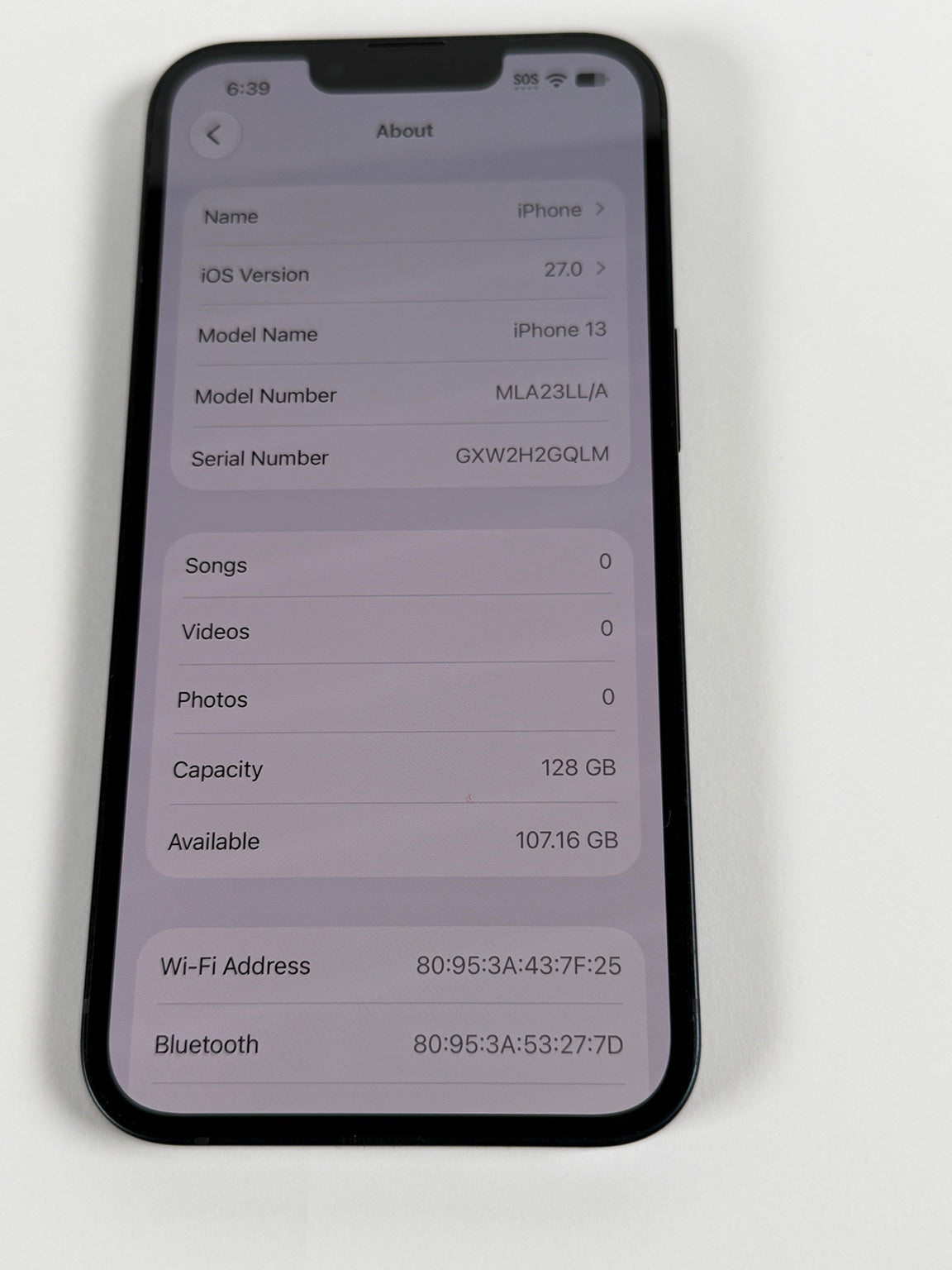 Apple iPhone 13 settings showing 128GB storage capacity