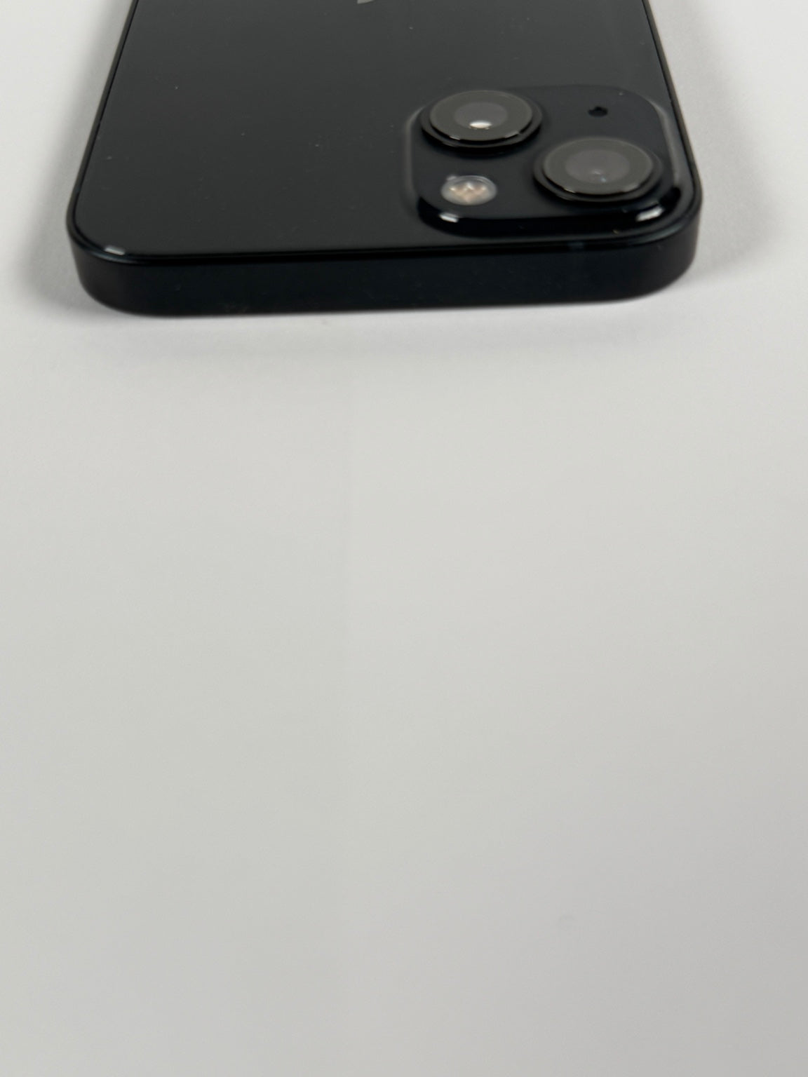 Apple iPhone 13 rear dual camera lenses close-up
