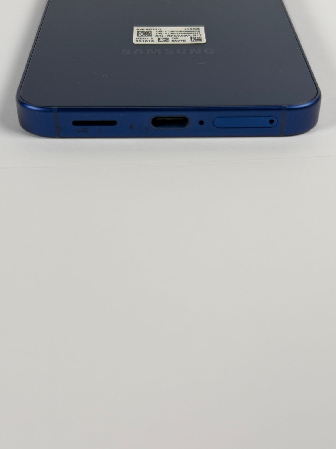Samsung Galaxy S25 bottom edge showing USB-C charging port and speaker