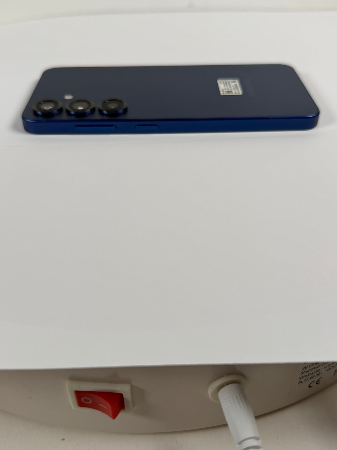Samsung Galaxy S25 Navy Blue side view showing power and volume buttons