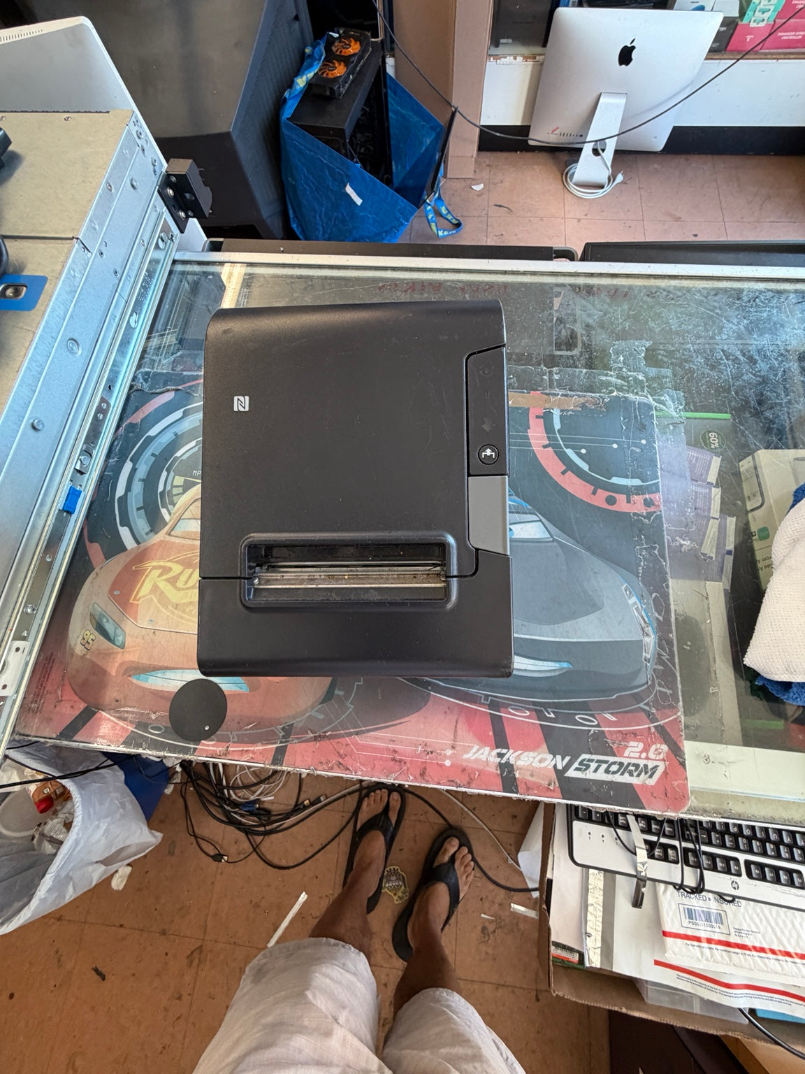 Epson TM-T88VI thermal receipt printer top view showing paper exit and controls