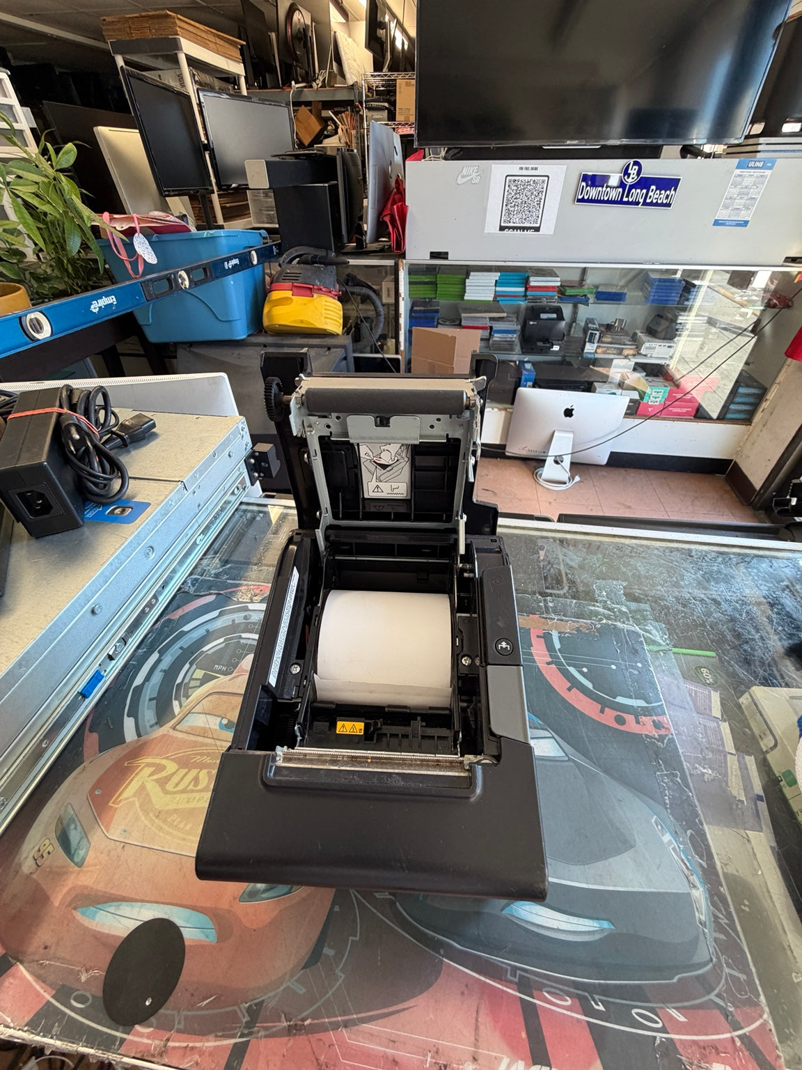 Epson TM-T88VI receipt printer open paper compartment with thermal paper roll