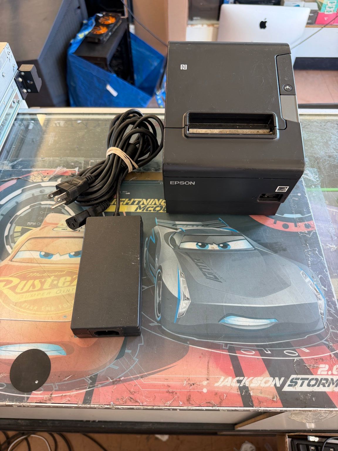 Epson TM-T88VI black POS thermal receipt printer with included power adapter and cord