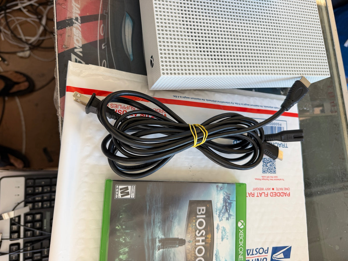 Xbox One S console with power cord and HDMI cable