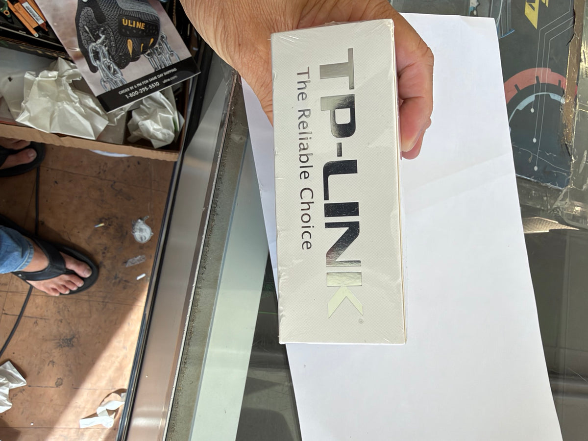 TP-Link TL-WR710N Mini Pocket Wireless Router brand logo on factory sealed retail box