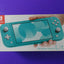 Nintendo Switch Lite – Turquoise Handheld Console – Portable Gaming System - WeBuyElectronic