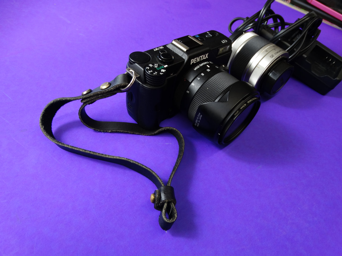Pentax Q7 Mirrorless Camera Kit – Body + 2 Lenses (Pentax 02 Standard Zoom) + Charger & Strap