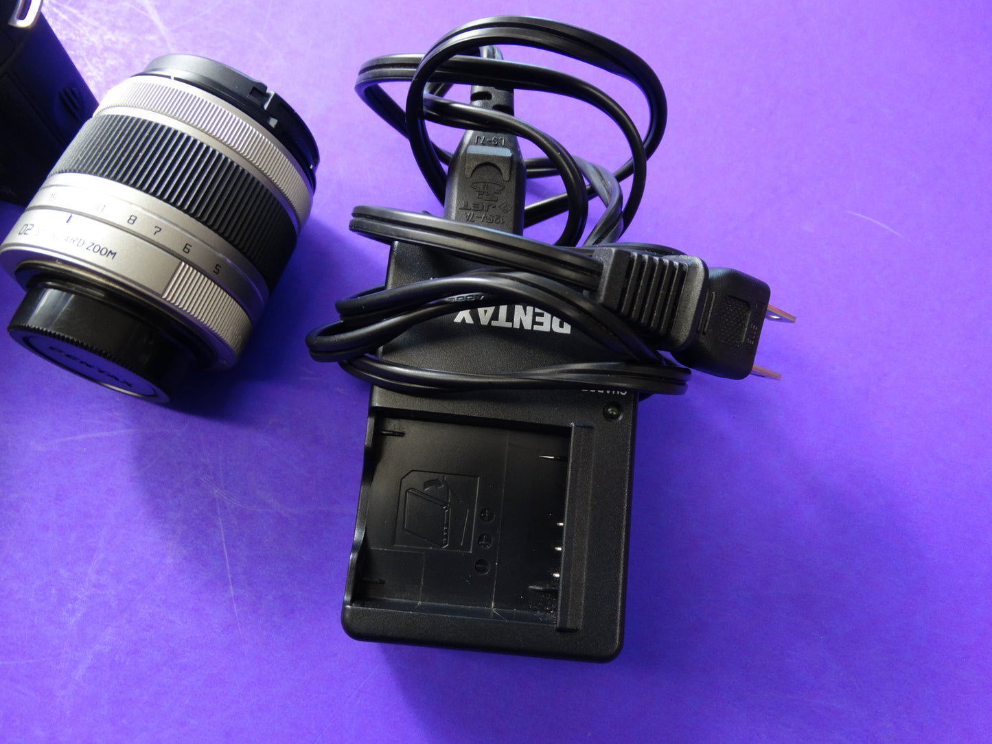 Pentax Q7 Mirrorless Camera Kit – Body + 2 Lenses (Pentax 02 Standard Zoom) + Charger & Strap