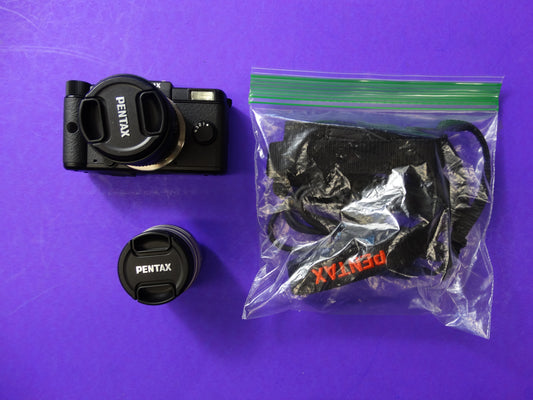 Pentax Q Mirrorless Digital Camera with 01 Standard Prime 8.5mm f/1.9 & 02 Standard Zoom 5–15mm Lenses