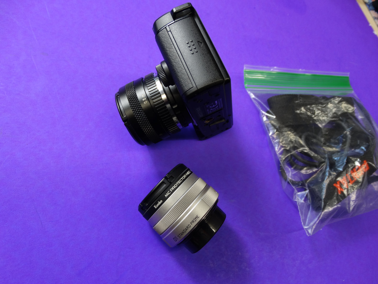 Pentax Q Mirrorless Digital Camera with 01 Standard Prime 8.5mm f/1.9 & 02 Standard Zoom 5–15mm Lenses